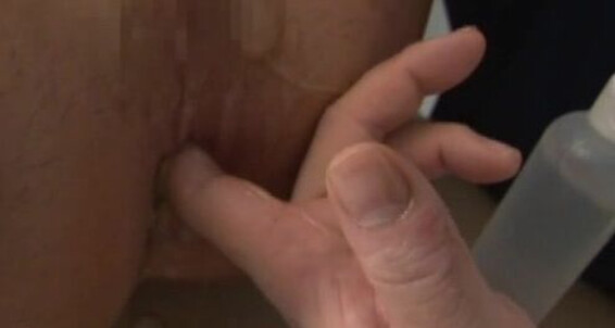 Watch this Asian boy stretch and jerk off his way to orgasm
